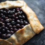 Blueberry crostata on a pizza stone